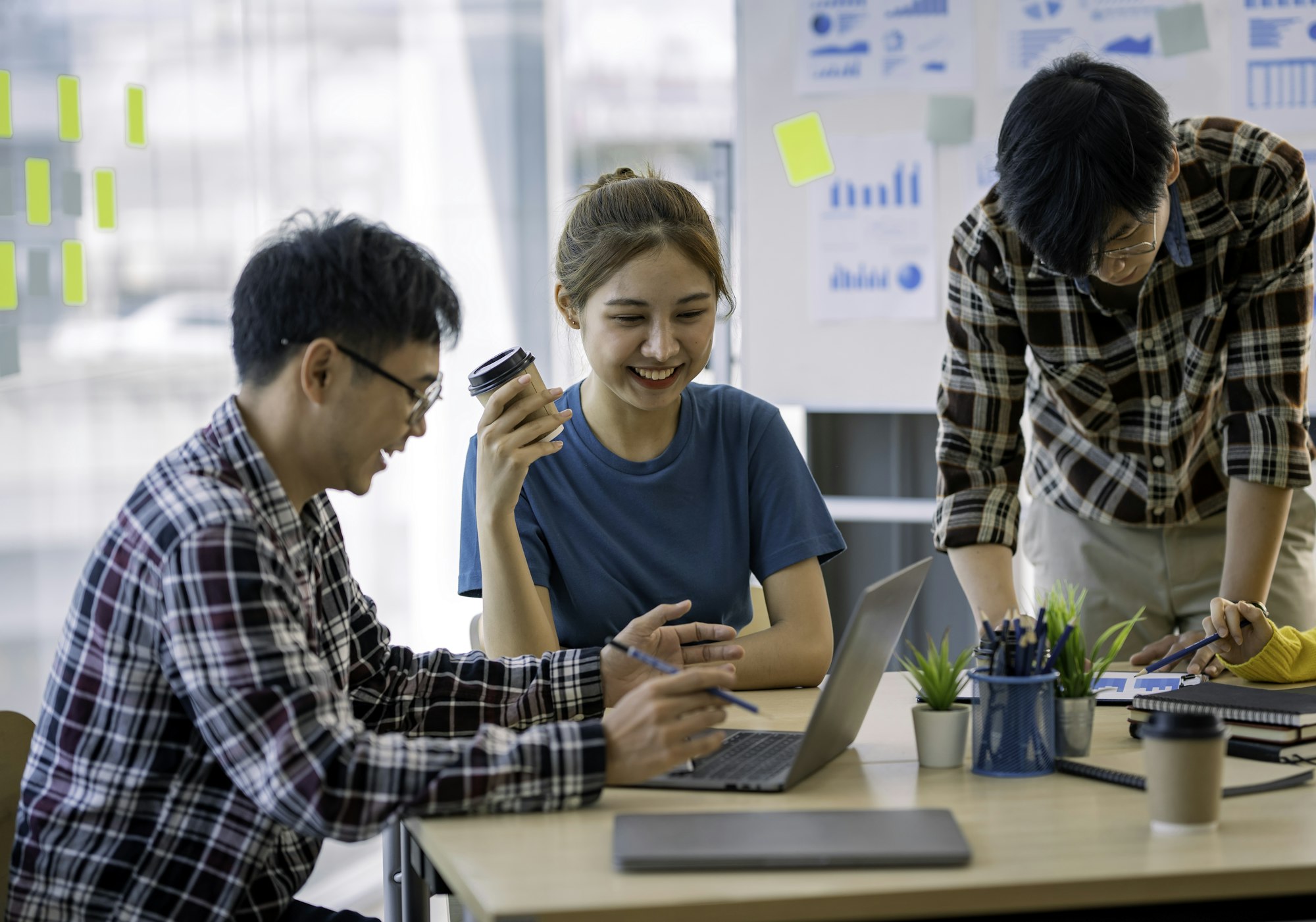 Group of Asian businessmen meeting team in modern office ​​Design planning structures and modern con