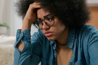 Sad worried African American woman upset suffer stress psychological problem anxiety depression