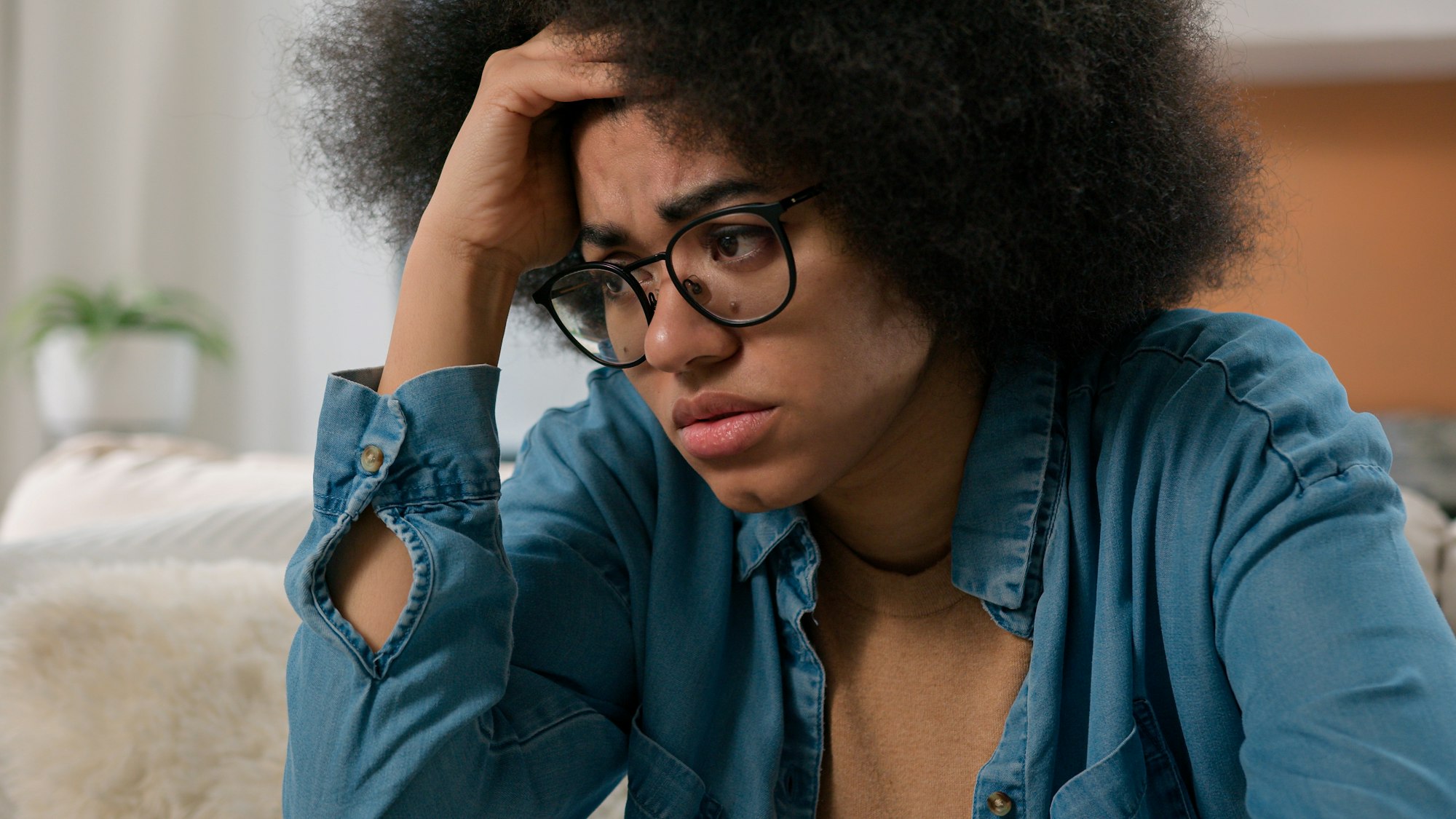 Sad worried African American woman upset suffer stress psychological problem anxiety depression