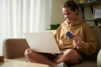 Woman doing shopping online at home